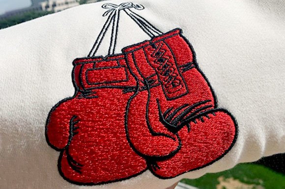 Red Boxing Gloves: A Bold Embroidery Design for Apparel Projects
