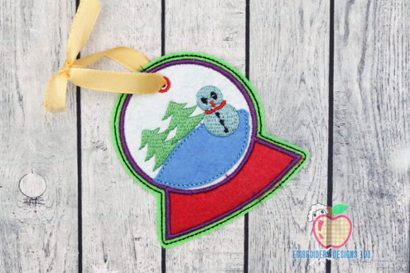 Snowman in a Snowglobe: A Festive Embroidery Design for Craft Fairs